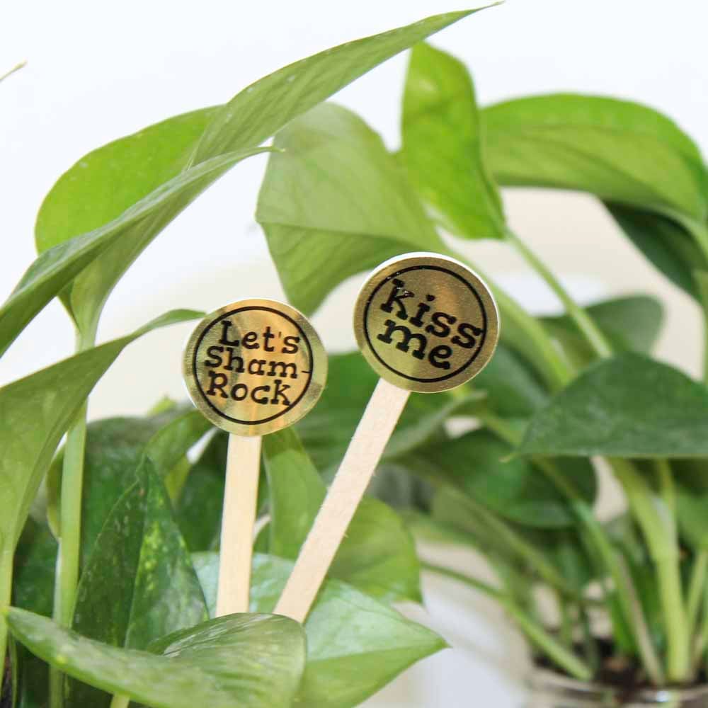 1" metallic gold circle labels in use as plant/garden markers for St. Patrick's Day