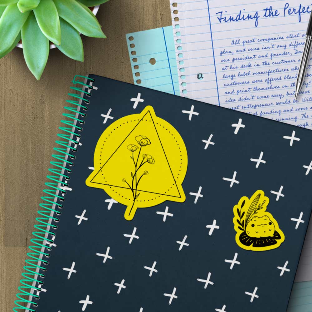 True yellow stickers on a notebook.