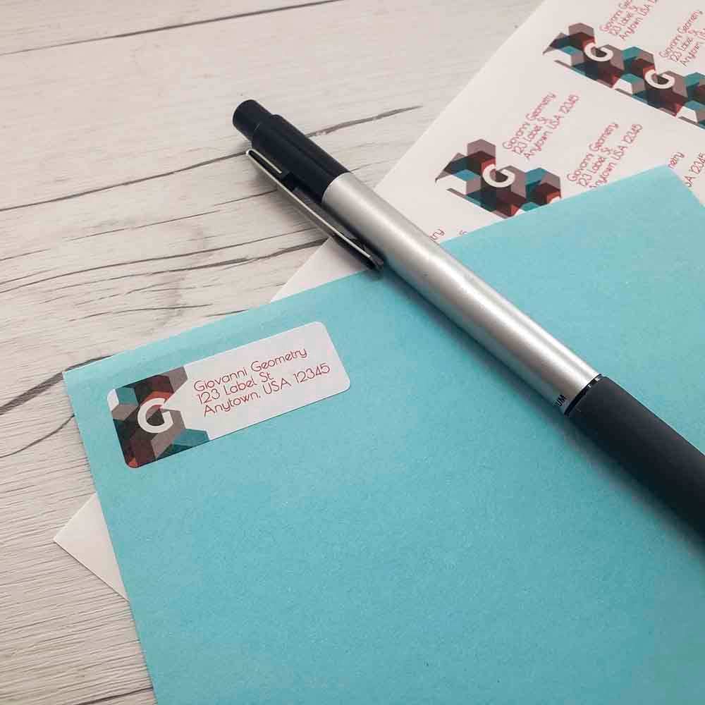 1.75" x 0.5" standard white matte return address label on blue envelope