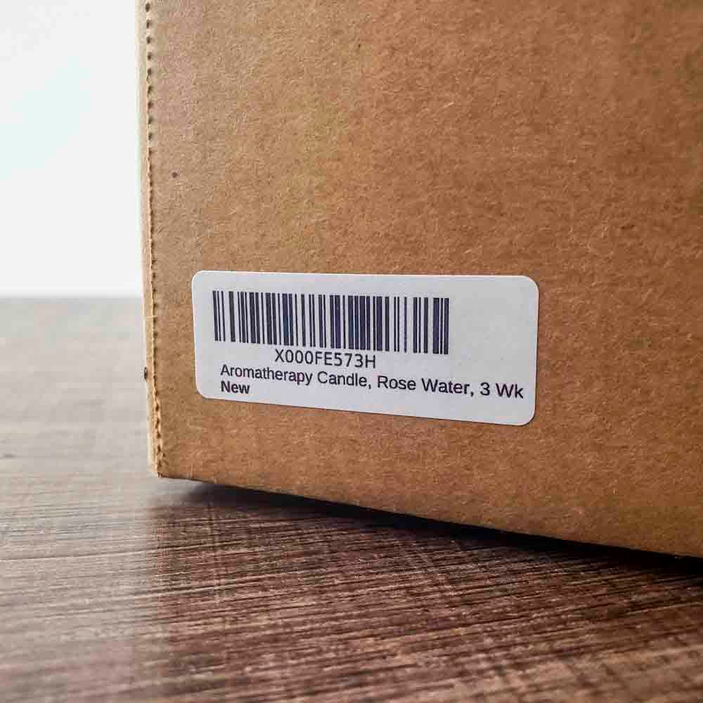 2.62" x 1" white matte Amazon FBA FNSKU label on cardboard box