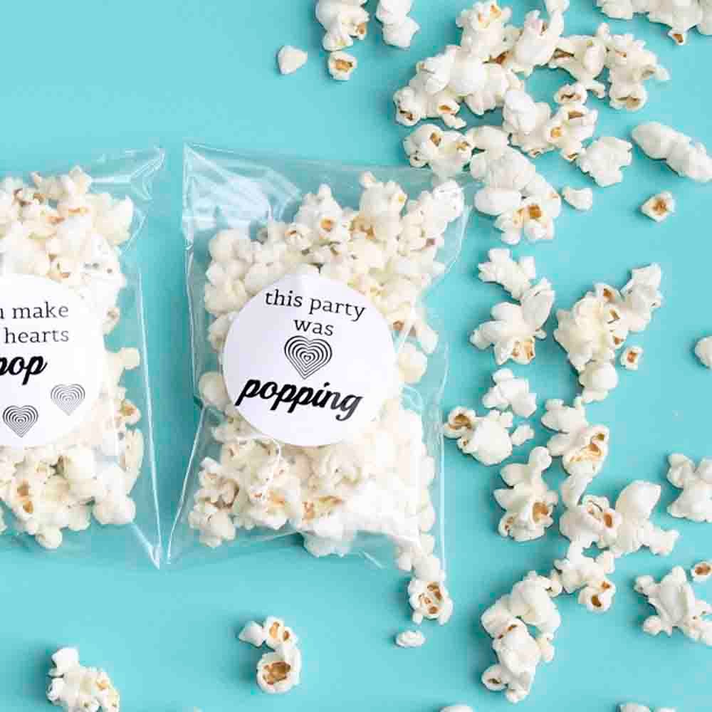 2.25" round label on white gloss laser used as a party favor label for popcorn