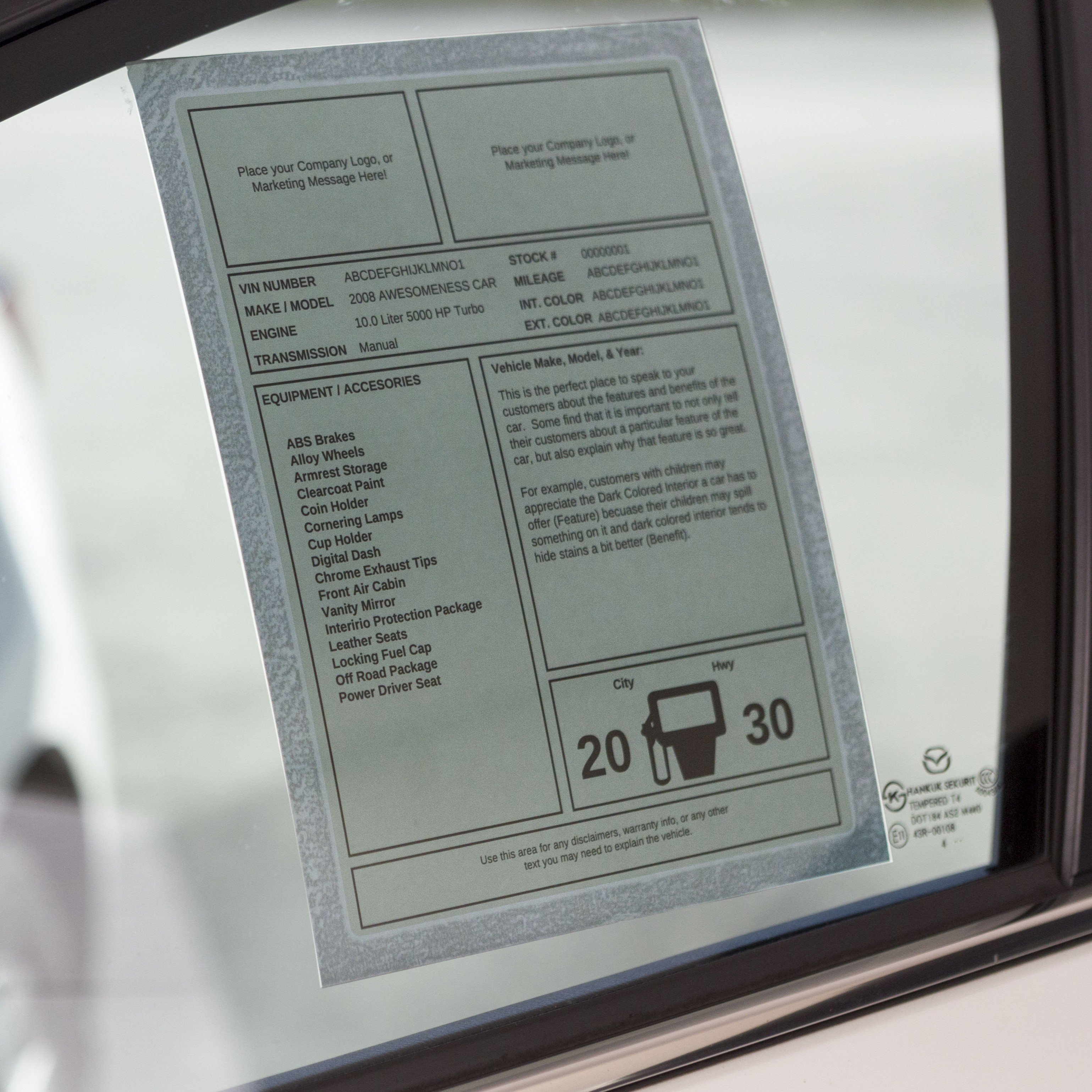 Full sheet Monroney Sticker on a car window 