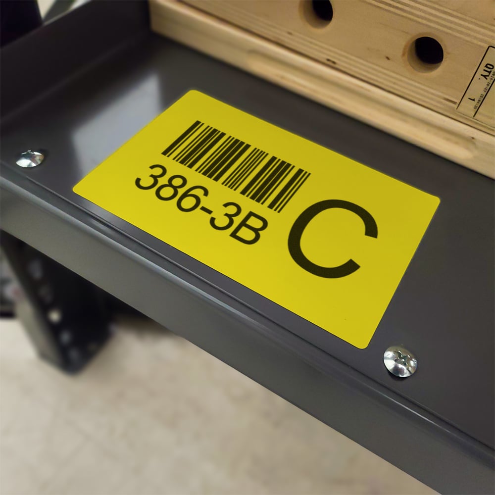 Yellow direct thermal label on a shelf.