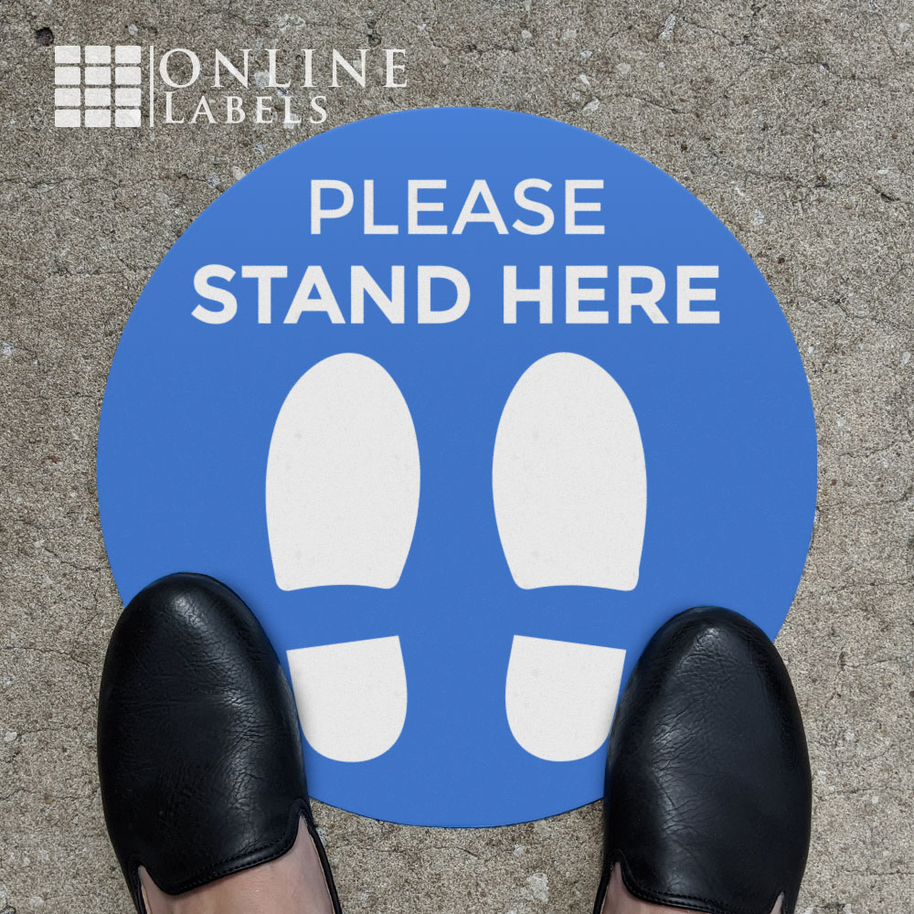 Feet on social distancing floor decal