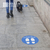Social distancing floor decal on sidewalk
