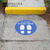 Social distancing decal in front of outdoor walkway/steps