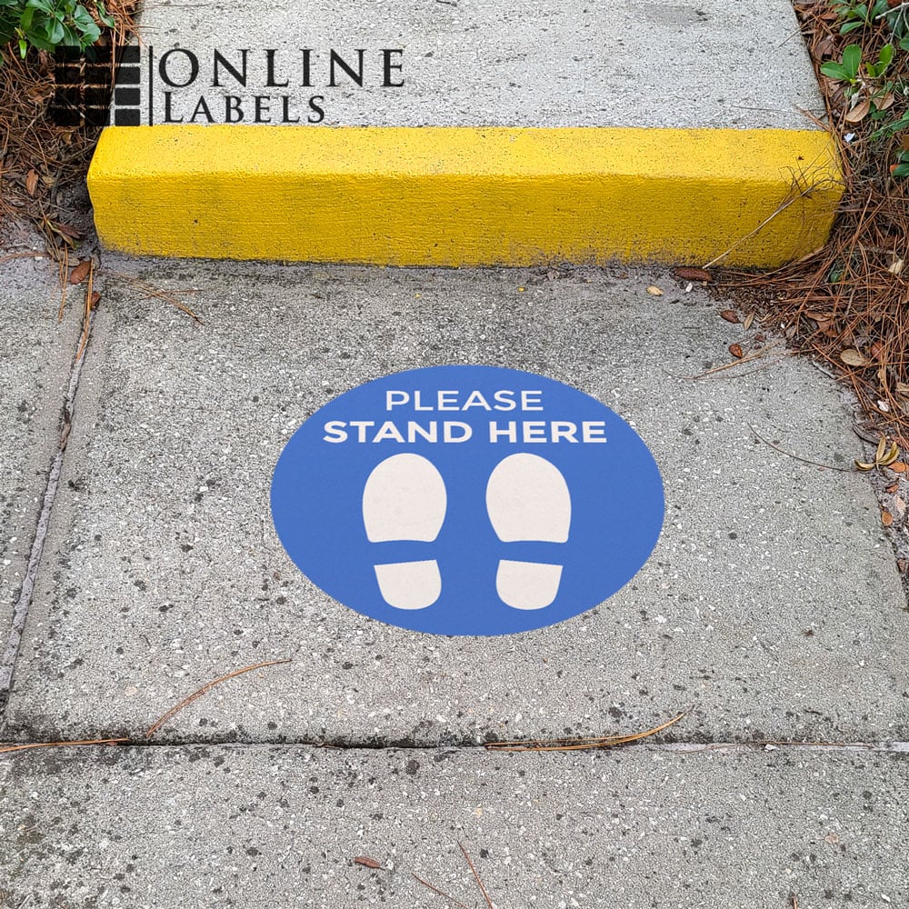 Social distancing decal in front of outdoor walkway/steps