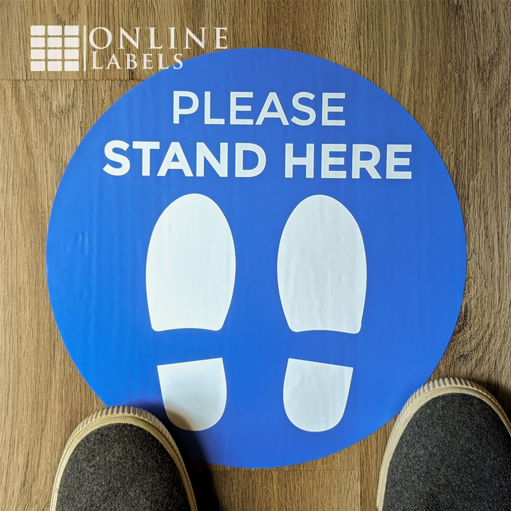 Feet on social distancing floor decal