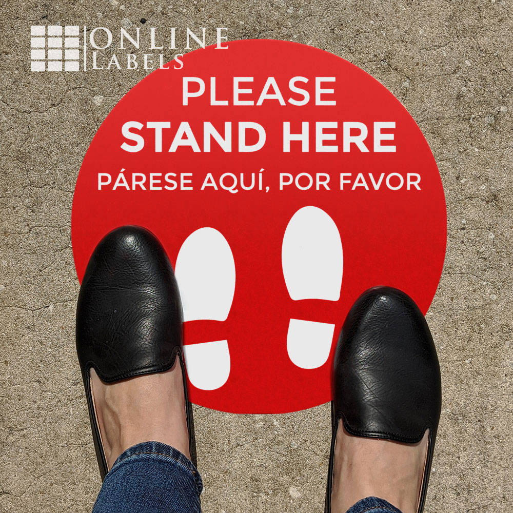 Feet on social distancing floor decal