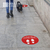 Social distancing floor decal on sidewalk