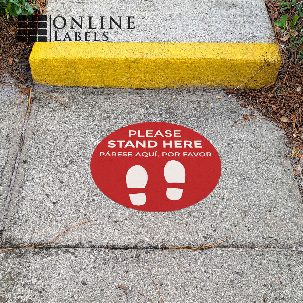 Social distancing decal in front of outdoor walkway/steps