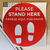 Social distancing floor decal in shipping envelope for delivery
