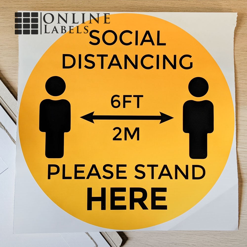 Social distancing floor sticker in shipping envelope