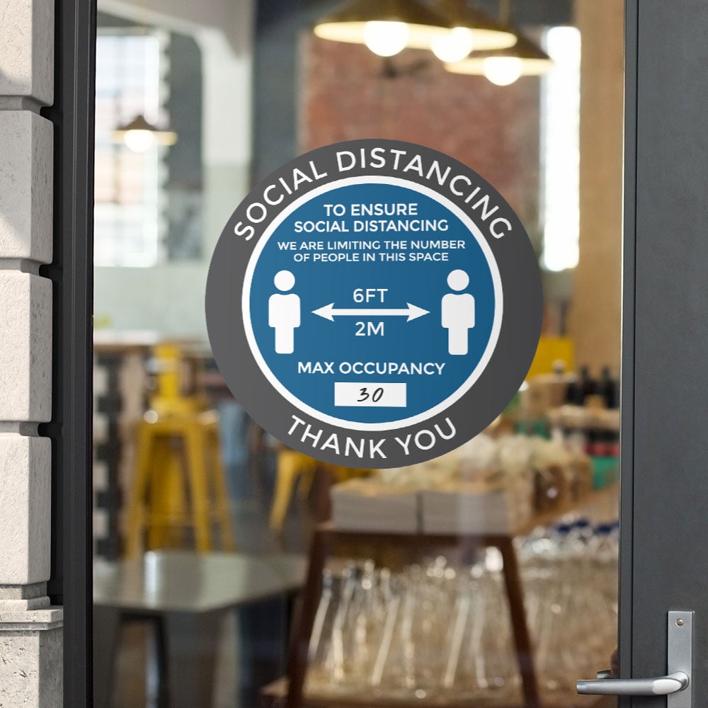 Blue "Social distancing, to ensure social distancing, we are limiting the number of people in this space, max occupancy: __, 6 FT, 2M, thank you" window/wall sticker on glass door pane of restaurant