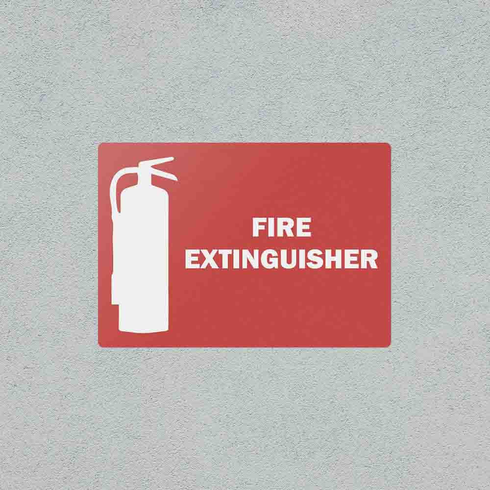 Fire extinguisher safety sticker on a wall.