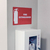 Fire extinguisher safety sticker above fire extinguisher.