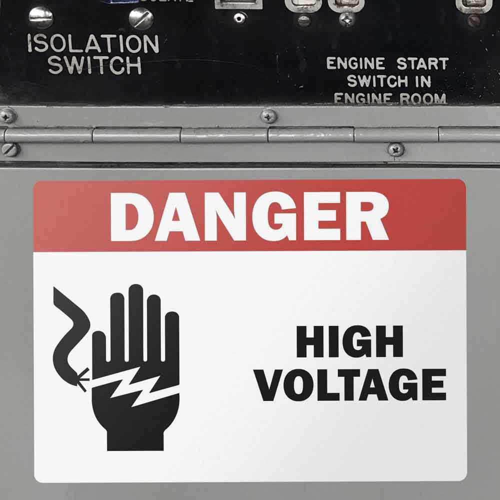 High Voltage safety sticker on machinery.