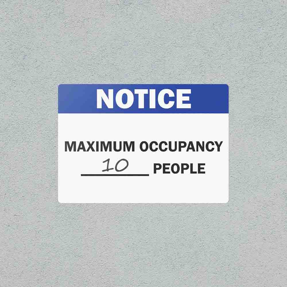 Max Occupancy safety sticker on a wall.