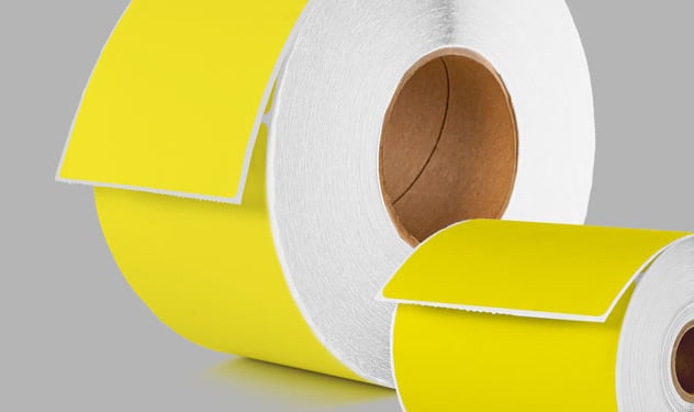 Yellow direct thermal labels on a roll